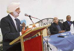 Premider Singh Sandhawalia addresses a gathering after the release of his book "Beyond Identity" at a function in Sector 22, Chandigarh, on Monday.