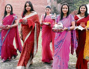 Women return home after performing the Karva Chauth puja in Sector 44, Chandigarh,