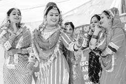 Artistes perform at the Azadi Express train welcome function in Jammu.