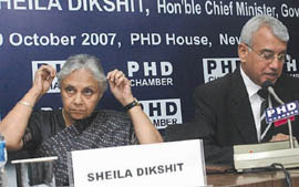 Delhi Chief Minister Sheila Dikshit and Sanjay Bhatia, president, PHD Chambers, during a conference