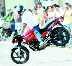 A biker performs a daring stunt at DAVIET in Jalandhar on Tuesday.