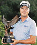 Daniel Chopra of Sweden holds his trophy after winning the Ginn Sur Mer Classic at Tesoro in Port Saint Lucie, Florida, on Monday.