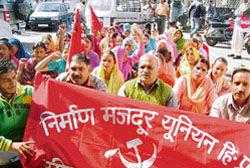 Anganwari workers and water carriers hold a dharna under the banner of CITU at Palampu