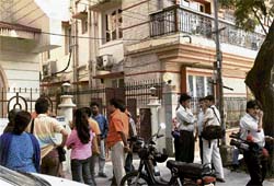 A CLOSE WATCH: Mediapersons outside Todi residence. The CBI has been interrogating members of the Todi family