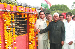 Urban development and PWD minister R.K. Chauhan lays stone of a community centre at Nasirpur Village, in the Capital