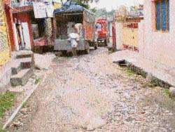 One of the damaged roads in Palampur.