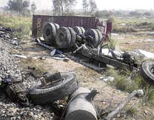 The scene of the accident near Rohad village in which a mini-truck collided with a train on Monday. 