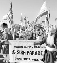 Devotees participate in the 28th Sikh Annual Parade in Yuba City, USA, on Sunday.