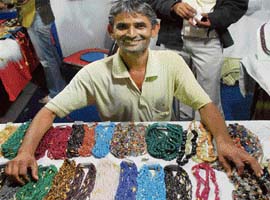 D.R. Yadav with his collection of bead strings at the Diwali mela in Sector 34, Chandigarh