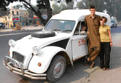 Lee Tardy and his wife Christelle Carre pose for the camera in Panipat.