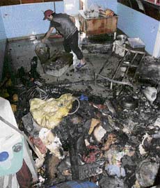 An inside view of a shop gutted in a fire in Lower Bazars meat market at Shimla early