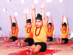 Students of Junior Study School present an item during a ‘festival of dance’ in Amritsar.