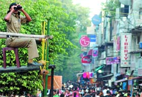 Delhi Police personnel keeping vigil at Sarojini Nagar Market on the eve of Divali in the Capital