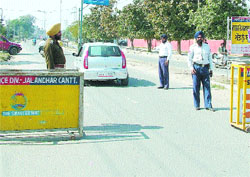Cops keep a strict vigil.