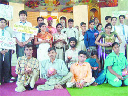 The members of the Roshni Society along with APJ School students at the Sacred Heart church