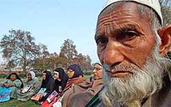 Relatives of disappeared persons take part in a silent sit-in demonstration in Srinagar on Saturday to protest against the disappearance of thousands of Kashmiris since the start of an insurgency 14 years ago. The protest was organised by the Association of Parents of Disappeared Persons.