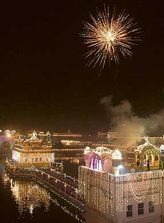 Crackers burst over an illuminated Golden Temple on the occasion of Bandi Chhor Divas and Diwali in Amritsar. 