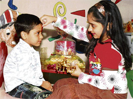 A girl applies ‘tilak’ on her brother’s forehead on Bhaiya Dooj in Ludhiana on Sunday.
