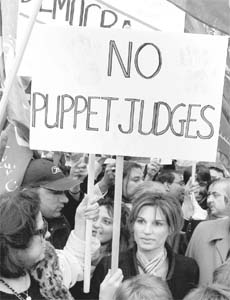 Jemima Khan (right), former wife of Pakistan cricketer and politician Imran Khan, attends a demonstration in central London