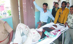 The victim being shifted to hospital.