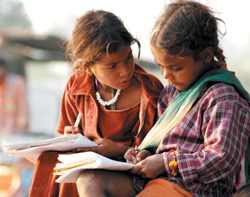 We know its importance: After a days hard work, children from poor families are engrossed in study at Bathinda.