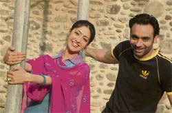 Babbu Mann and Gurleen Chopra during the shooting of Punjabi film ‘Hashar’ at Panjab University, Chandigarh, on Tuesday.