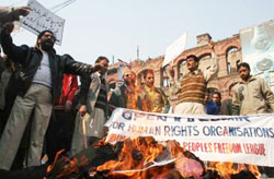 Activists of the Jammu and Kashmir Peoples Freedom League, protest against the alleged human rights violations in the Kashmir valley, in Srinagar 