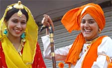 Tradition alive: Performers pose for the camera at the heritage festival in Bathinda on Friday.