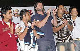 Members of the Chandigarh Lions team (from left) Pakistans Imran Farhat, New Zealands Chris Cairns and Indias Dinesh Mongia clap during an event to promote the Indian Cricket League at Sukhna Lake on Saturday.