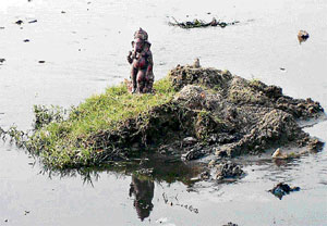 Used indiscriminately for religious rituals, bathing and cattle wading by those living on its banks, the river has become a dumping ground for the very people it sustains.