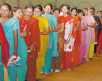 A long wait: Girls queued up to get admission to a one-year course at a camp organised by a private aviation institute in Muktsar on Sunday.
