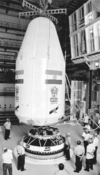 The payload capsule of the GSLV (top) being integrated with a Russian-supplied cryogenic stage. Courtesy, ISRO