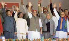 (From left) Himachal BJP chief Jairam Thakur, Satya Pal Jain, BJP president Rajnath Singh, vice-president Shanta Kumar and Hamirpur MP P.K. Dhumal weave to the crowd before the start of the Yuva Garjana rally at Mandi on Sunday. 