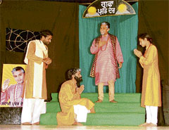 Artistes enact a scene from play staged at Guru Nanak Bhawan in Ludhiana on Saturday.