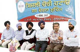 Chief engineer B.S. Bath (third from left) with PSEB officials at an awareness programme against power theft at Gausgarh village, Ludhiana.