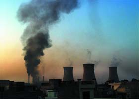 The smoke billowing out of the chimneys of Guru Nanak Dev Thermal Power Plant in Bathinda