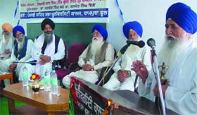 Joginder Singh Vedanti (extreme right), Jathedar Akal Takht, speaking at a seminar that was organised on the book written by former Shiromani Gurudwara Parbandhak Committee (SGPC) president, Prof Kirpal Singh Badungar (third from right) at Rampura Phul
