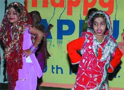 Schoolchildren participate in a dance to celebrate Appu's 23rd birthday, at Appu Ghar in the Capital on Monday