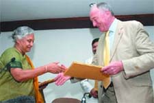 Delhi Chief Minister Sheila Dikshit and Mayor of London Ken Livingstone exchange documents after signing the Delhi-London Partnership Agreement in the Capital on Monday.