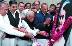 DPCC president J P Aggarwal with Delhi Congress MPs pay tributes to former Prime Minister Indira Gandhi on her 90th birth anniversary at DPCC office in the Capital on Monday. 