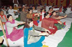 Yoga catching on: Men and women attend yoga classes in Fatehabad on Monday. Photo: Sushil Manav