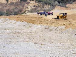 A hillock being levelled at Jalgran village in Una district. 