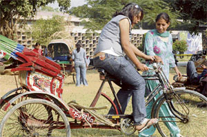 A girl tries her hand at the rickshaw, during preparations for the forthcoming Chandigarh Carnival-2007, on Wednesday.