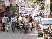 Teachers under the banner of the Haryana College Teachers Association hold a procession in Yamunanagar on Wednesday to protest against the attack on a lecturer of MLN College.