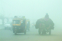 With fog engulfing the holy city, residents had a tough time fighting the cold