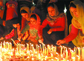 Devotees light candles at Model Town gurdwara in Jalandhar.