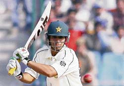 Pakistans Salman Butt plays a shot on the third day of the Delhi Test. 