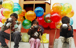 Not everyones cup of tea: Young balloon sellers sipping tea in Bathinda