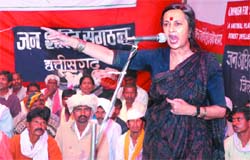 CPM politburo member Brinda Karat addresses tribals and forest dwellers during their dharna at Jantar Mantar in the Capital on Monday.