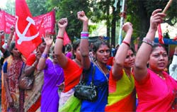 CITU members of garment factories demonstrate near Parliament in the Capital on Monday.